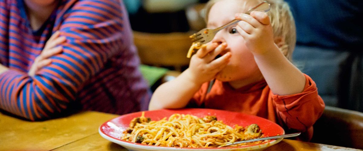 Boy eating spaghetti, WV