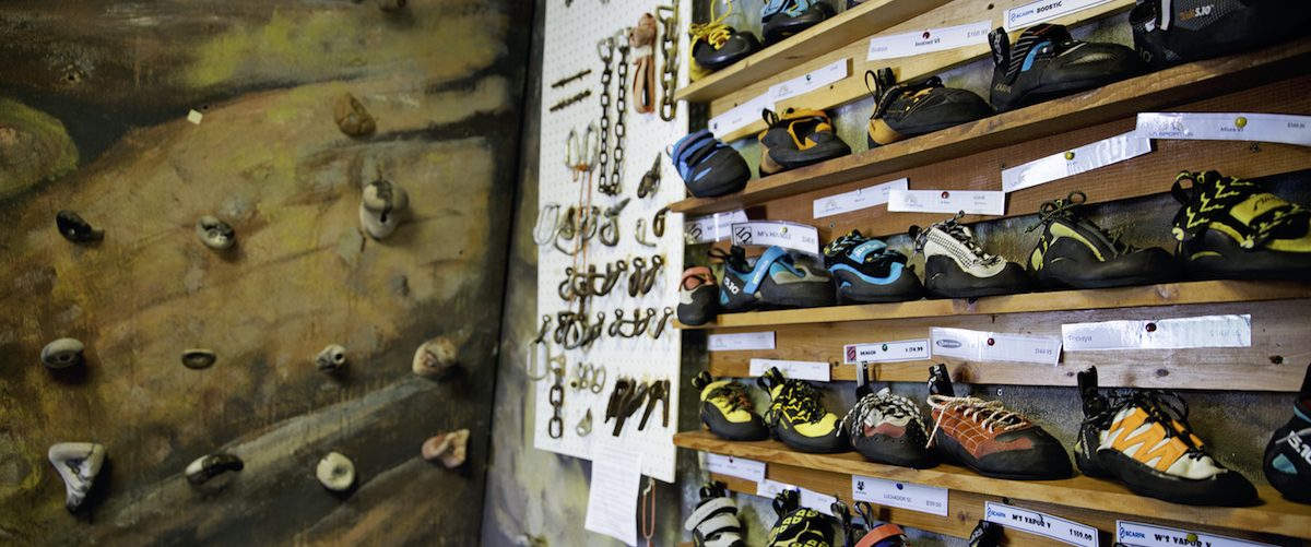 Indoor climbing wall and gear at Water Stone Outdoors
