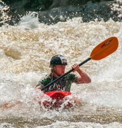 Kayaking whitewater rapids in West Virginia