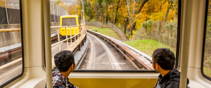 Two students riding the PRT in Morgantown, WV