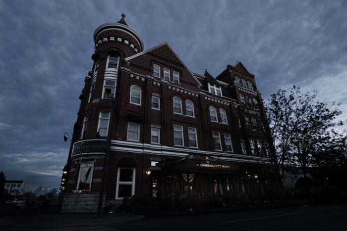 The exterior of the Blennerhassett Hotel & Spa sits under a dark, cloudy sky