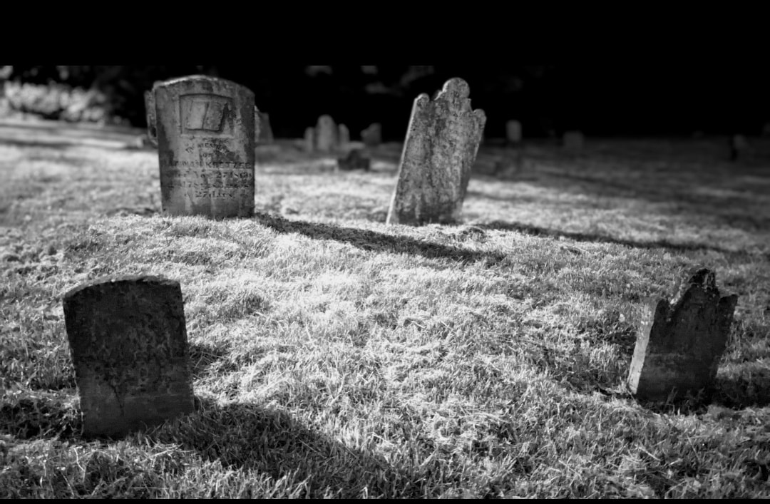An eerie graveyard in Shepherdstown, shown in black and white
