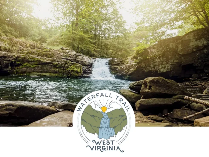 Waterfall cascading into a calm pool, surrounded by mossy rocks and lush trees, with a West Virginia Waterfall Trail badge overlaid on the image.